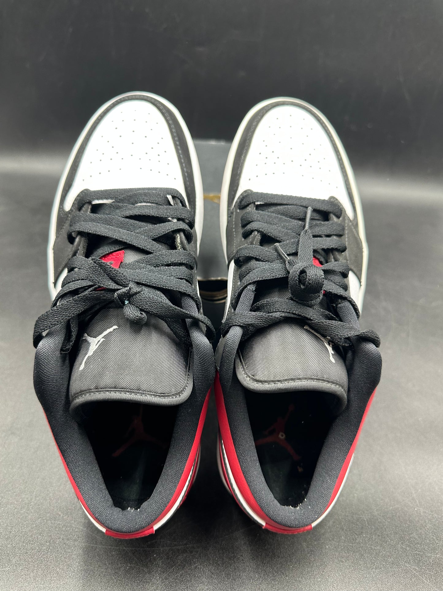 Jordan 1 low black toe