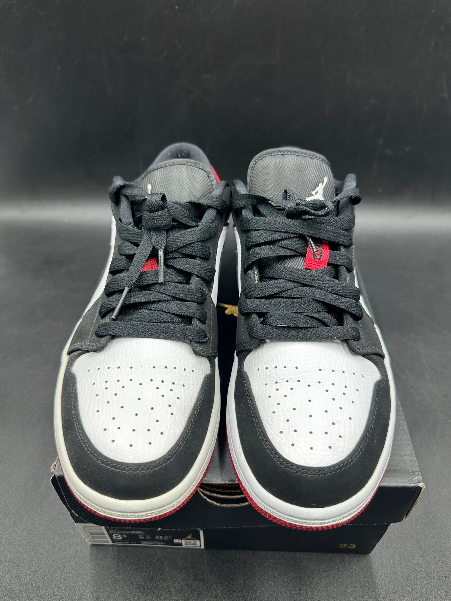 Jordan 1 low black toe